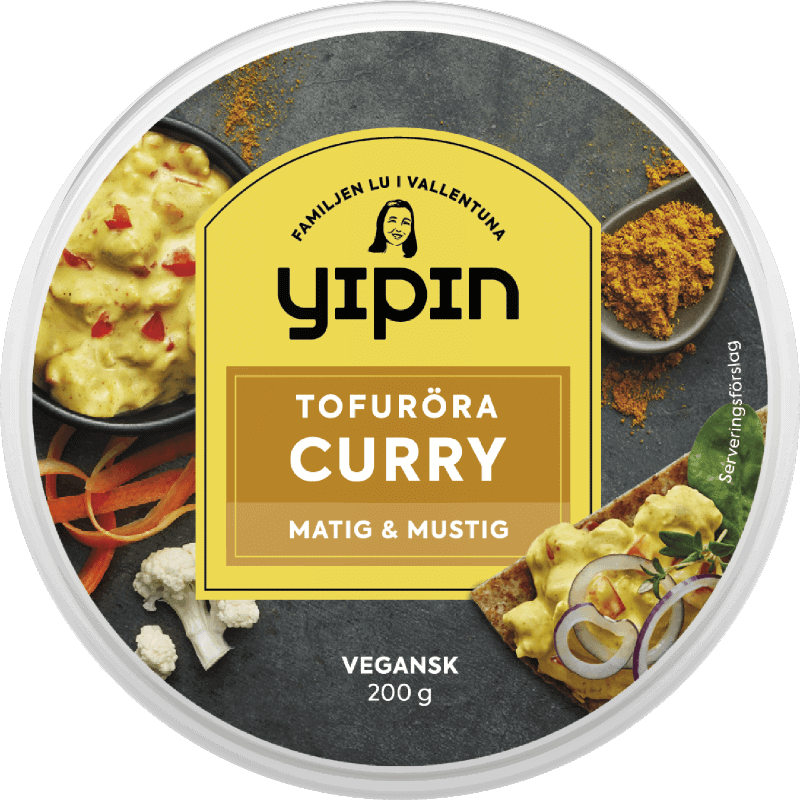 Bilden visar förpackningen till 200 g Yipin Tofuröra Curry, en vegansk curryröra.